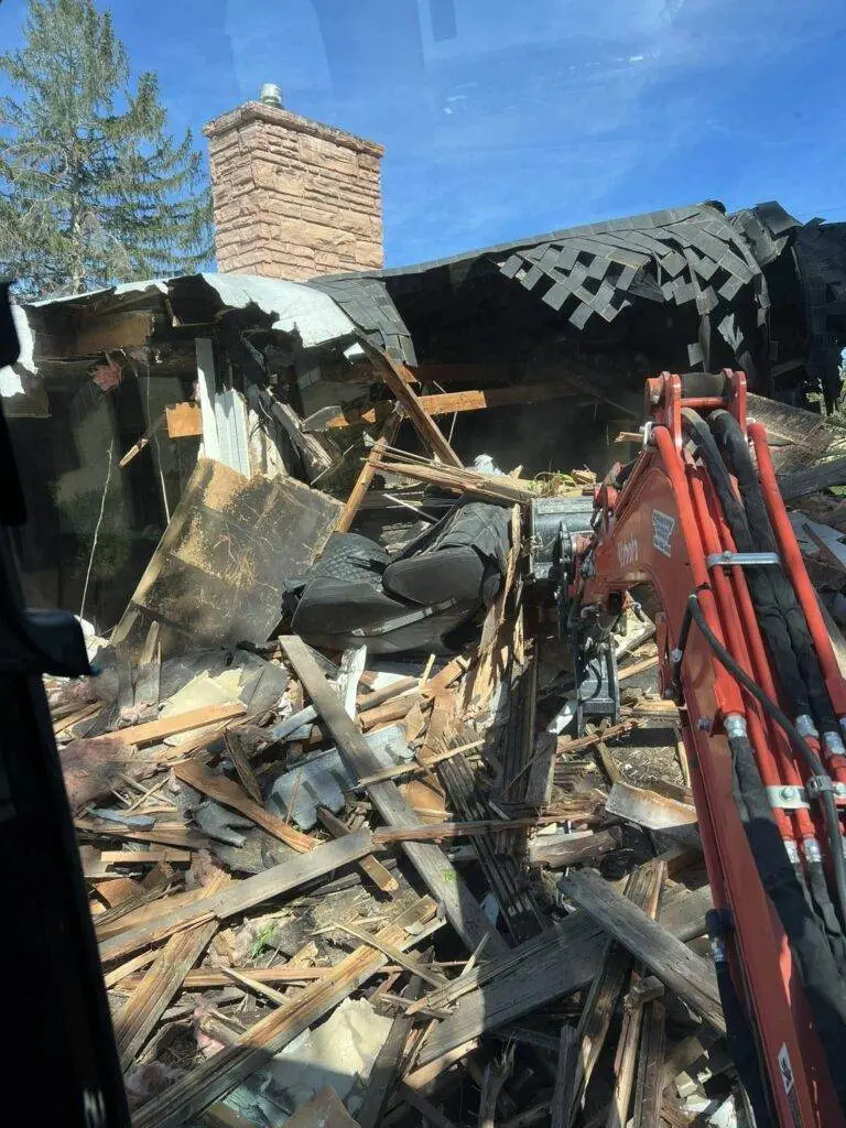 a building with a pile of debris